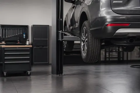 Clean, organized licensed and insured auto repair service bay with professional equipment