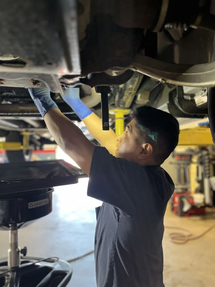 Mechanical repair work underway on a vehicle at the Wappingers Falls auto shop