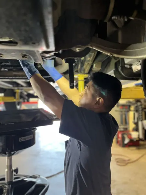 Mechanical repair work underway on a vehicle at the Wappingers Falls auto shop